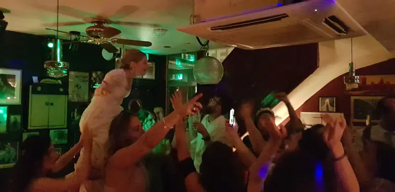 Green-lit dance floor