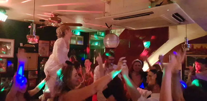 Bride above the crowd