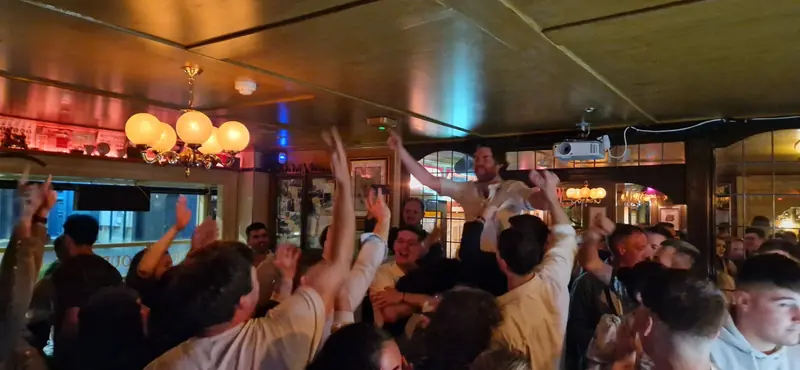 Arms up on a packed dance floor